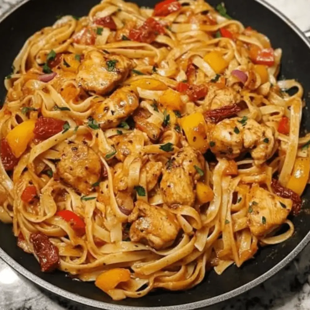 Creamy Cajun Chicken Linguine with Peppers and Sun-Dried Tomatoes